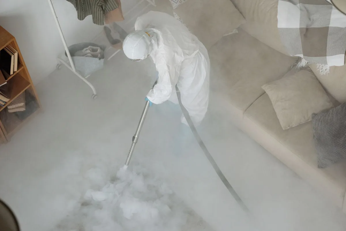Biohazard cleanup technician in protective equipment, Mt. Tabor, Portland, OR